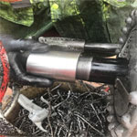 Employee is hand testing the threads